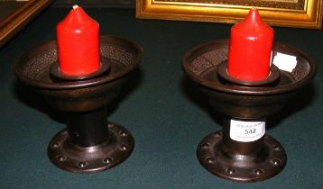 A pair of German Goberg Arts & Crafts style candlesticks, each 9cm high (excluding candles)
