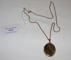 A 9ct oval locket and chain