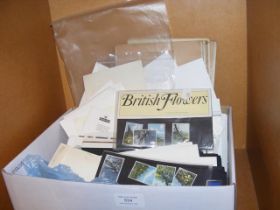 A box of assorted stamps