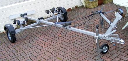 A three wheeled boat trailer - approx. length 370c
