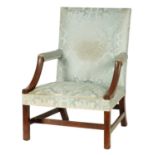 A GEROGE III MAHOGANY GAINSBOROUGH CHAIR OF GENEROUS SIZE