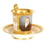 A 19TH CENTURY FRENCH PORCELAIN PORTRAIT CABINET CUP AND SAUCER