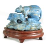 A CHINESE CARVED LAPIZ LAZULI SCULPTURE