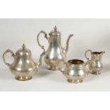 A VICTORIAN FOUR PIECE SILVER TEA SERVICE