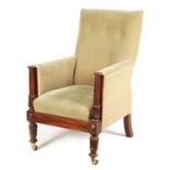 A LATE REGENCY MAHOGANY UPHOLSTERED LIBRARY ARMCHAIR