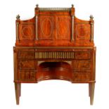 AN IMPRESSIVE EARLY 19TH CENTURY FLAME MAHOGANY AND BRASS MOUNTED RUSSIAN EMPIRE KNEEHOLE DESK