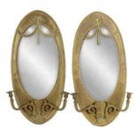 AN UNUSUAL PAIR OF 19TH CENTURY BRASS OVAL SHAPED ADAM STYLE GIRANDOLE MIRRORS