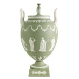 A LARGE WEDGWOOD SAGE GREEN URN-SHAPED LIDDED VASE