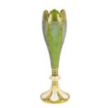 A 19TH CENTURY BOHEMIAN GREEN GLASS AND WHITE OVERLAY GILT VASE