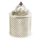 A LATE 19TH CENTURY SILVERED METAL TOBACCO CANISTER