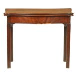 A GEORGE III SERPENTINE MAHOGANY CONCERTINA ACTION CARD TABLE