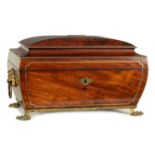 A FINE REGENCY BRASS INLAID FLAME MAHAGONY SARCOPHAGUS SHAPED TEA CADDY