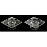 LALIQUE, FRANCE. A PAIR OF CLEAR GLASS SQUARE CANDLE HOLDERS IN THE CHANTILLY DESIGN