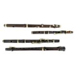 A COLLECTION OF 19/20TH CENTURY ROSEWOOD FLUTES