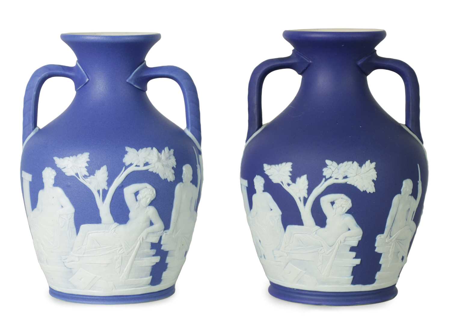 A PAIR OF WEDGWOOD DARK BLUE JASPER WARE MODEL OF THE PORTLAND VASE CIRCA 1900