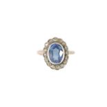 A 9CT GOLD BLUE SPINEL AND DIAMOND RING