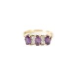 AN 18CT GOLD AMETHYST AND DIAMOND RING