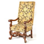 A 19TH CENTURY CARVED WALNUT UPHOLSTERED ARMCHAIR