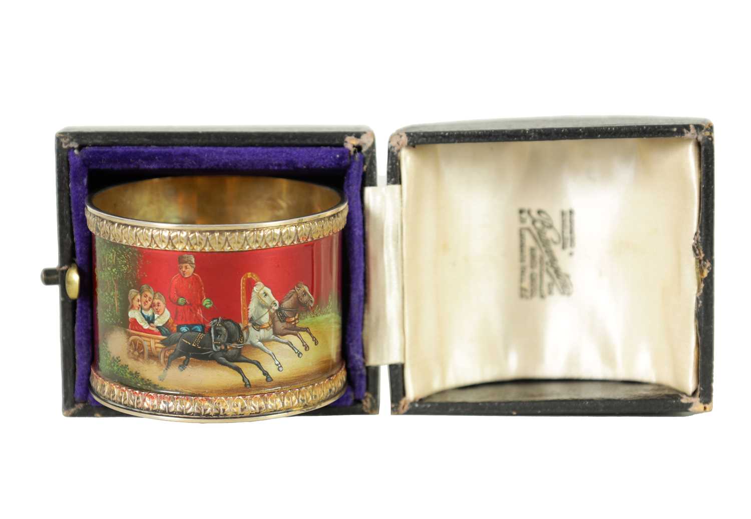 A LATE 19TH CENTURY RUSSIAN SILVER GILT AND GUILLOCHE ENAMEL NAPKIN RING