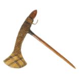 A 19TH CENTURY PAPUA NEW GUINEA JIWAKA CEREMONIAL AXE