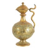 A VERY LARGE BRASS EWER