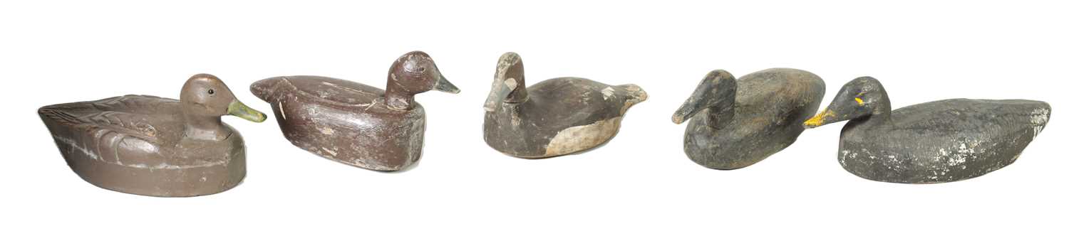 A SELECTION OF FIVE CARVED WOODEN DECOY DUCKS