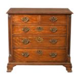 A GEORGE III FIGURED MAHOGANY LANCASHIRE CHEST OF DRAWERS