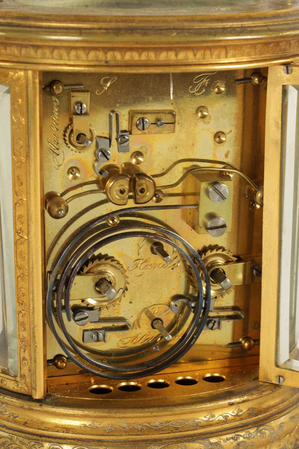 A LATE 19TH CENTURY OVAL ENGRAVED GILT BRASS CARRIAGE CLOCK REPEATER - Image 8 of 9