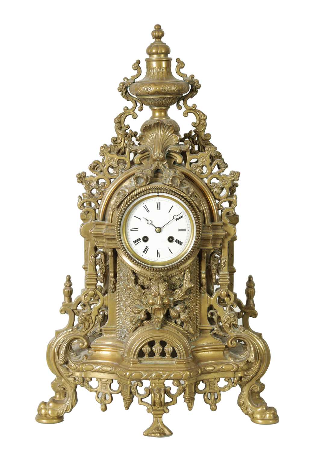 A LATE 19TH CENTURY FRENCH ORNATE AND PIERCED BRASS MANTEL CLOCK OF LARGE SIZE