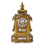 A LATE 19TH CENTURY ORMOLU AND PORCELAIN PANELLED MANTEL CLOCK