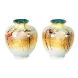 A PAIR OF ROYAL DOULTON PRINTED WARE BULBOUS SHOULDERED VASES SIGNED J PRICE