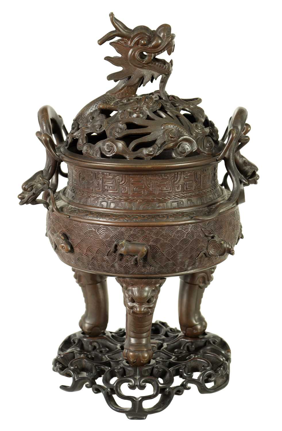 A 19TH CENTURY CHINESE BRONZE CENSER AND LID MOUNTED ON A HARDWOOD STAND