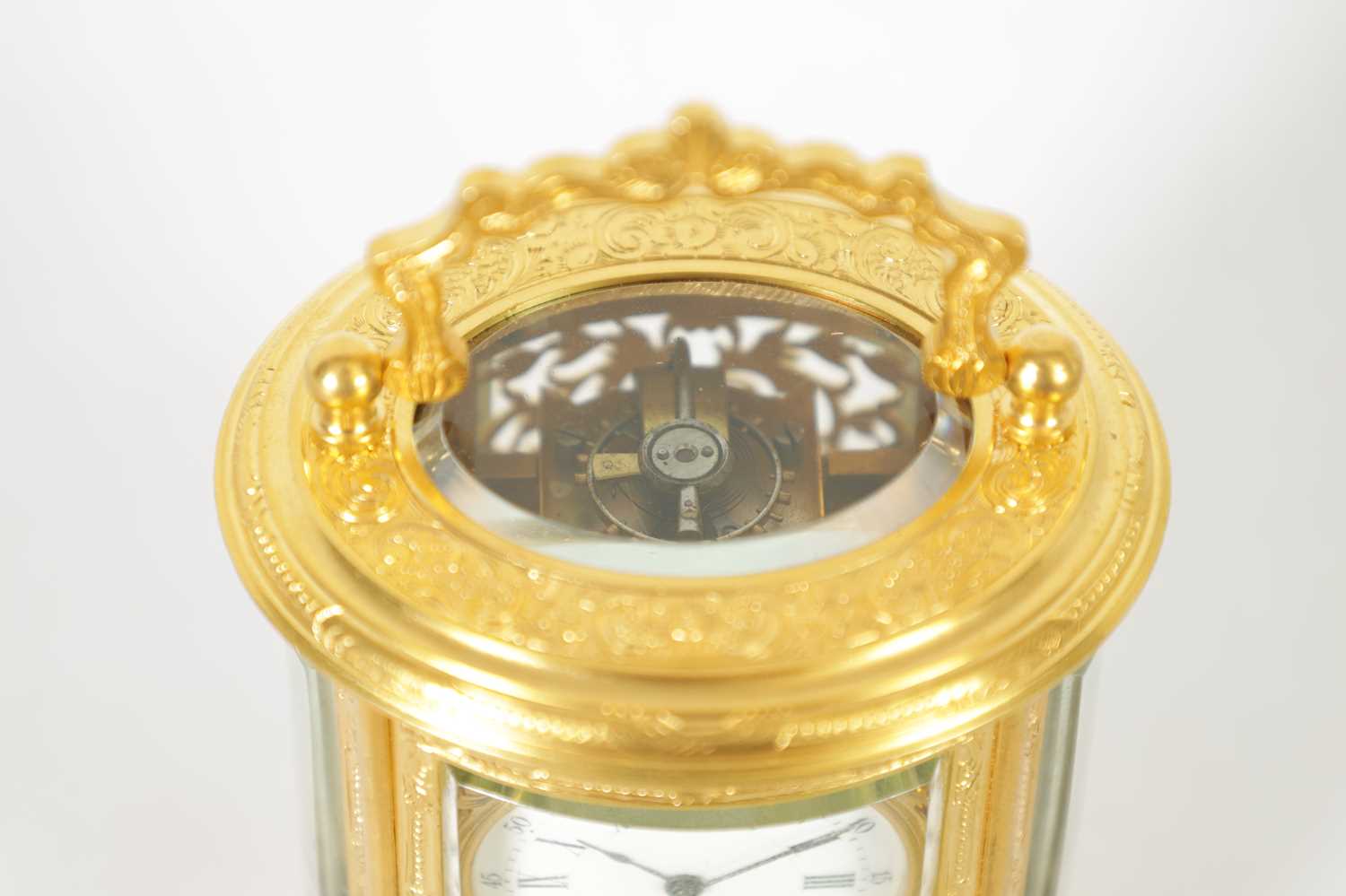 A LATE 19TH CENTURY FRENCH MINIATURE ENGRAVED OVAL CARRIAGE CLOCK - Image 3 of 9