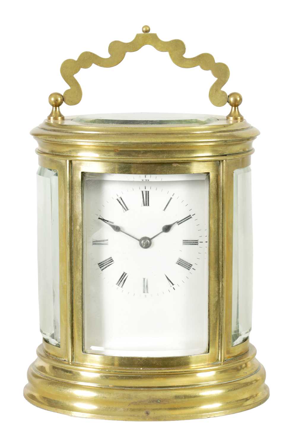 A LATE 19TH CENTURY OVAL REPEATING FRENCH CARRIAGE CLOCK