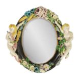 A LARGE 19TH-CENTURY CONTINENTAL OVAL MAJOLICA HANGING MIRROR