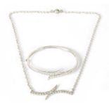AN 18CT WHITE GOLD DIAMOND NECKLACE AND BANGLE SET