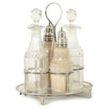 A GEORGE III SILVER FOUR BOTTLE CRUET STAND