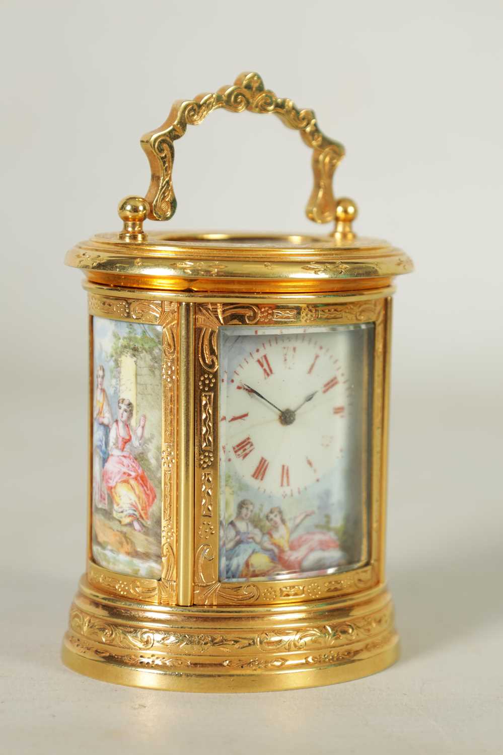 A LATE 19TH CENTURY MINIATURE PORCELAIN PANELLED ENGRAVED OVAL CARRIAGE CLOCK - Image 2 of 8