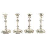 A SET OF FOUR EDWARD VII SILVER CANDLESTICKS