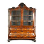 A LARGE 18TH CENTURY BOMBE SHAPED DOUBLE DOOR WALNUT AND FLORAL MARQUETRY DUTCH DISPLAY CABINET