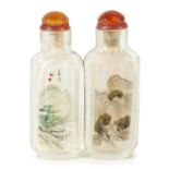 A 19TH CENTURY CHINESE FLATTENED DOUBLE GLASS SNUFF BOTTLE AND STOPPERS
