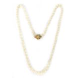 A CULTURED PEARL NECKLACE WITH 9CT GOLD CLASP