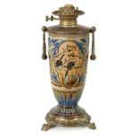 A 19TH-CENTURY DOULTON STONEWARE AND GILT BRASS MOUNTED OIL LAMP DECORATED BY FLORENCE BARLOW