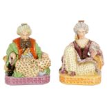 A PAIR OF 19TH CENTURY FRENCH FIGURAL PORCELAIN PERFUME BOTTLES BY JACOB PETIT