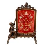 A LATE 19TH-CENTURY CONTINENTAL CARVED WALNUT TAPESTRY FIRE SCREEN