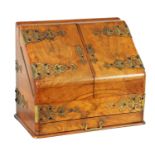 A GOOD 19TH CENTURY FIGURED WALNUT SLOPE FRONT STATIONARY BOX