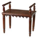 A LATE 19TH CENTURY ROSEWOOD WINDOW SEAT/STOOL IN THE MANNER OF GEORGE BULLOCK