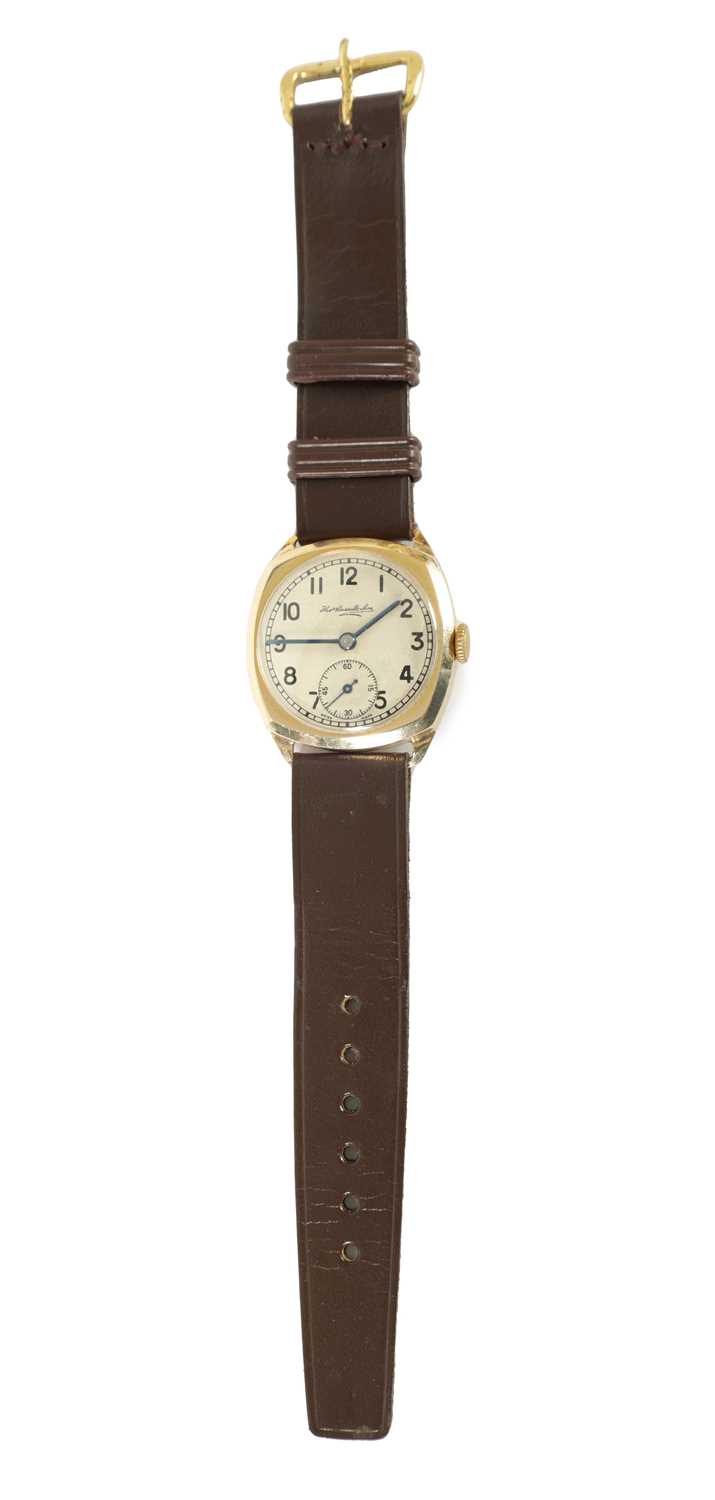 A 1960s 9CT GOLD CASED WRISTWATCH BY THOMAS RUSSELL