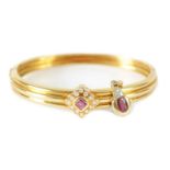 AN 18CT GOLD RUBY AND DIAMOND BRACELET AND PENDANT