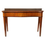 A GEORGE III SERPENTINE MAHOGANY SERVING TABLE
